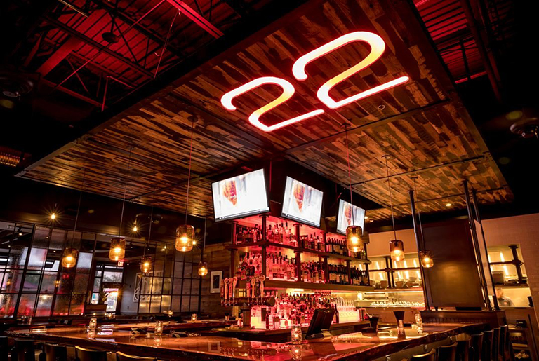 Interior of Square 22, an upscale modern American restaurant with elevated comfort food, craft cocktails, and wine.